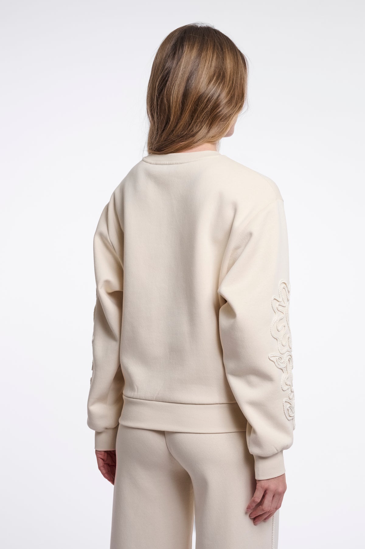 Rino & Pelle Manar Crew Neck Jumper with Appliqué Sleeves in Off White